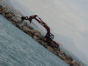 caterpillar, building a breakwater. 2004-09-27, Sony Cybershot DSC-F717., photo by thomas nolf.