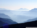 faint mountains surrounding bozen