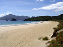 sealer's bay - der einzige sandstrand der insel || foto details: 2005-12-17, codfish island, new zealand, Sony Cybershot DSC-F717.
