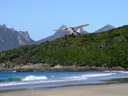 ...zurück ans festland || foto details: 2005-12-28, codfish island, new zealand, Sony Cybershot DSC-F717. keywords: airplane, starting, take off, lift-off