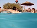 playing pool games, in the middle of the desert.