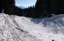 panorama: avalanche field and two kids for scale. 2009-04-07, Sony F828. keywords: snowslide