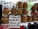 in a store nearby: turkish viagra. looked rather like an assortment of nuts. also, check out the impressive sculpture in the far right.. 2010-02-09, Sony F828.