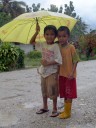 two indonesian boys in the rain.. 2011-09-09 07:01:19, DSC-F828.