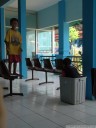 kids were playing hide and seek at the bus station. one kid actually hid in the garbage bin.