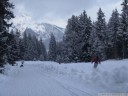 sledging-in-action photo, skiers right beside us on the slope.