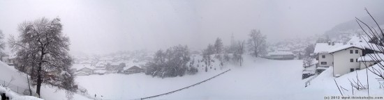 panorama: a different view - thaur during strong winter snowfall