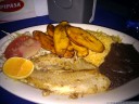 typical costa rican dinner: casado. rice, beans, fried plantains/bananas, and grilled fish/meat/cheese.