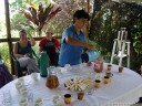 dona christina prepares tea with fresh sugarcane sticks. 2011-02-09 10:37:16, DSC-F828.