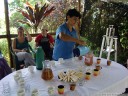 dona christina prepares tea with fresh sugarcane sticks